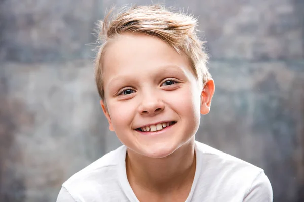 depositphotos_133078960-stock-photo-cute-smiling-boy